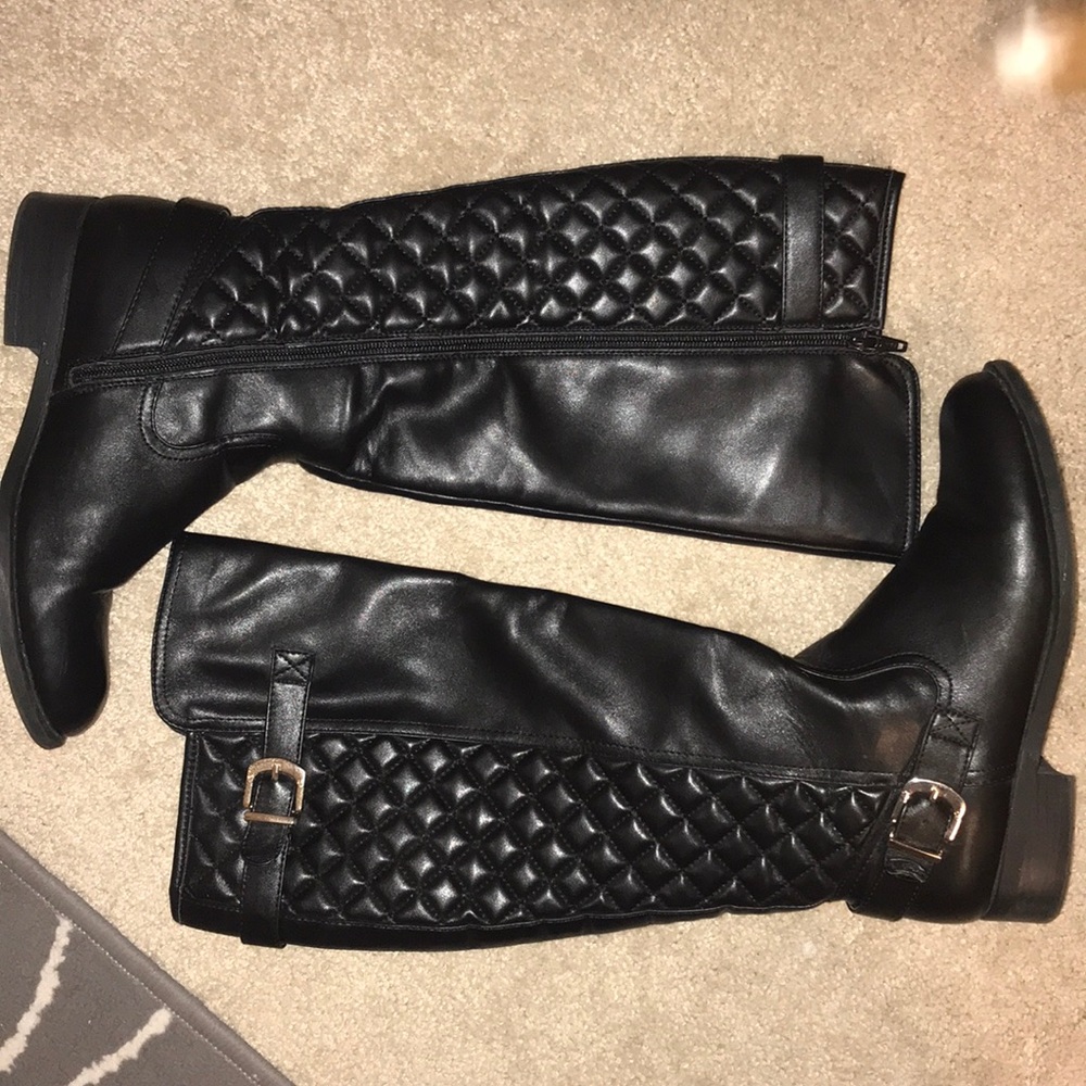 Black tall boots with buckles